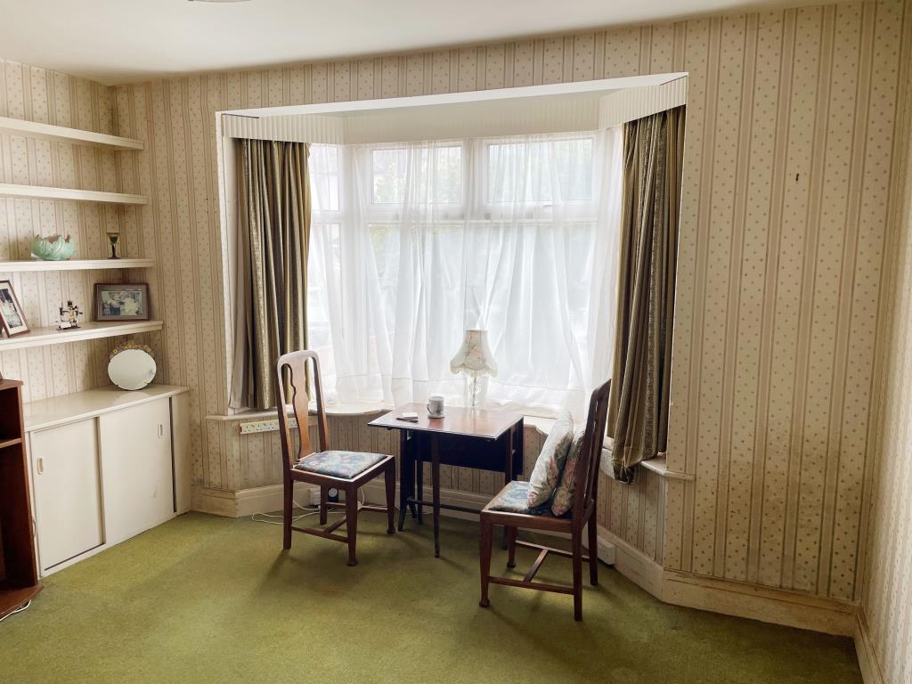 Lot: 19 - HOUSE IN NEED OF REFURBISHMENT AND REPAIR - Dining room with window to front of house